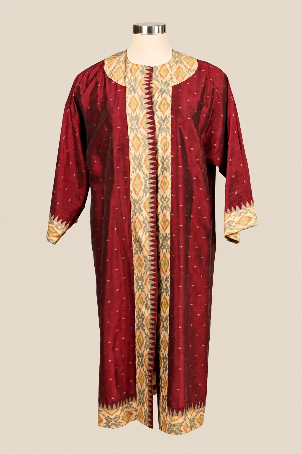 Maroon Amara on a cream dress form